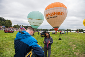 A filming crew at a hot air balloon event, representing Exclusive Ballooning’s expertise in hot air balloon marketing campaigns.